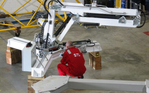 Photograph of Proteus 100 under construction by an STL technician in the workshop